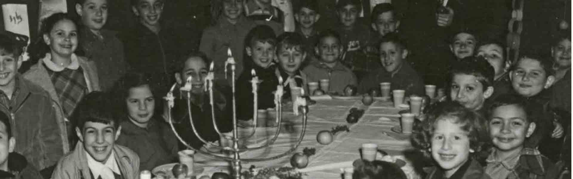 Children Eating at the Jewish Educational Association's Sukkah